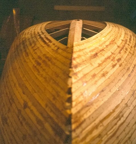 First layer of planking on Feather