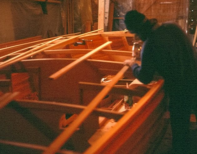 Founder Steve Van Dam assembling feather.