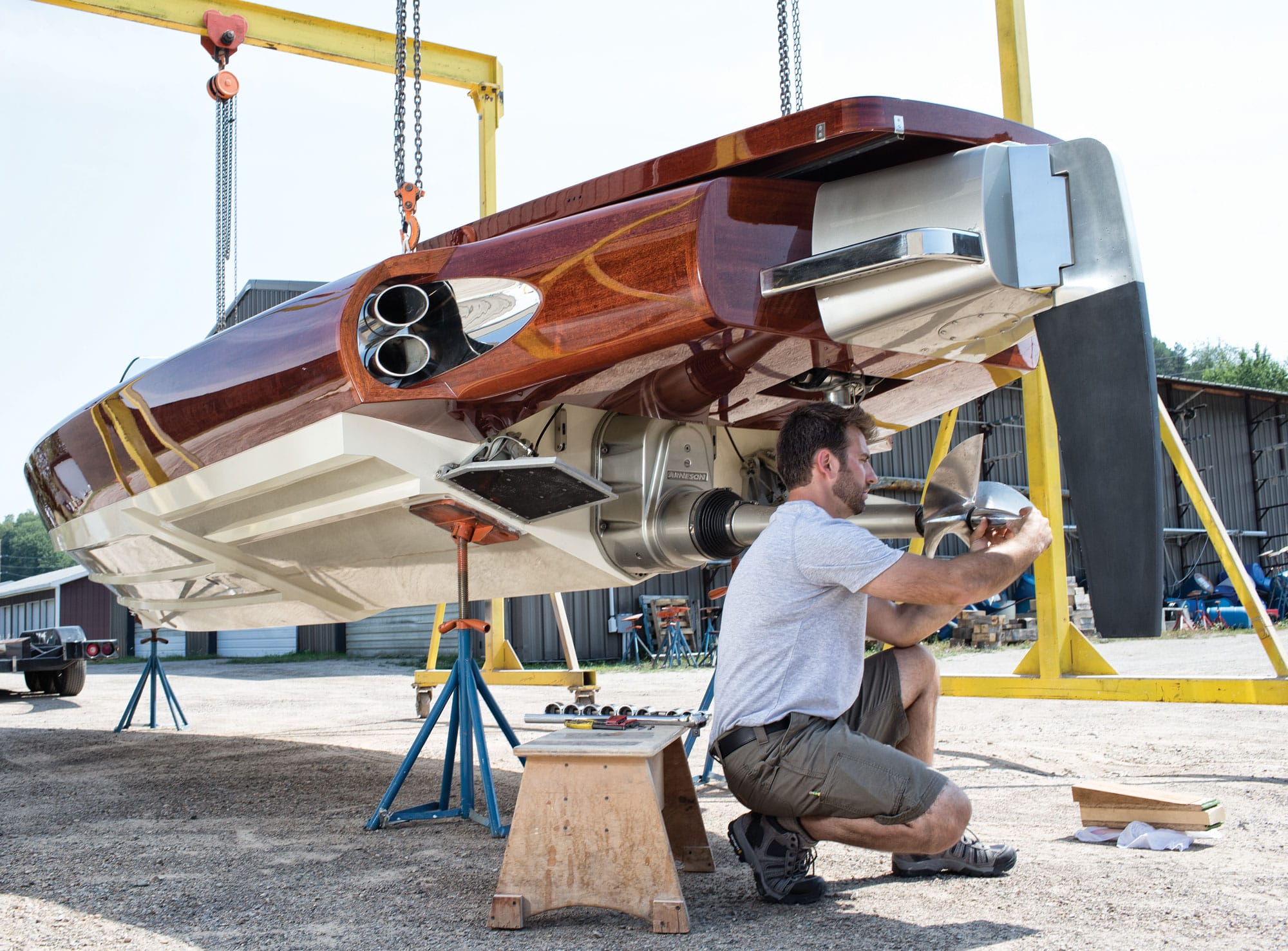 Metalshop craftsman adjusting the propulsion system of Alpha Z