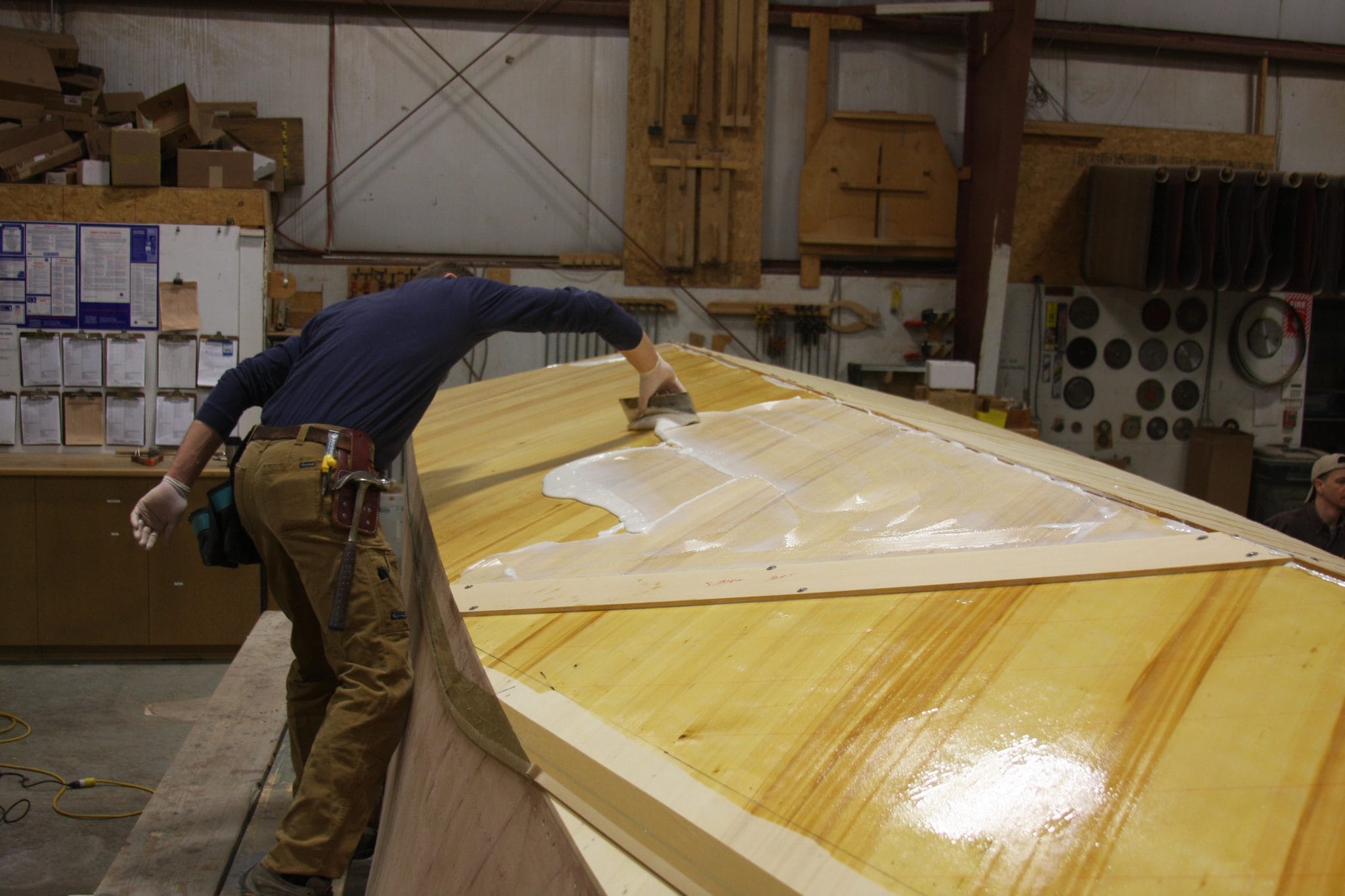 Applying epoxy to layer of planking on 3/4 Time