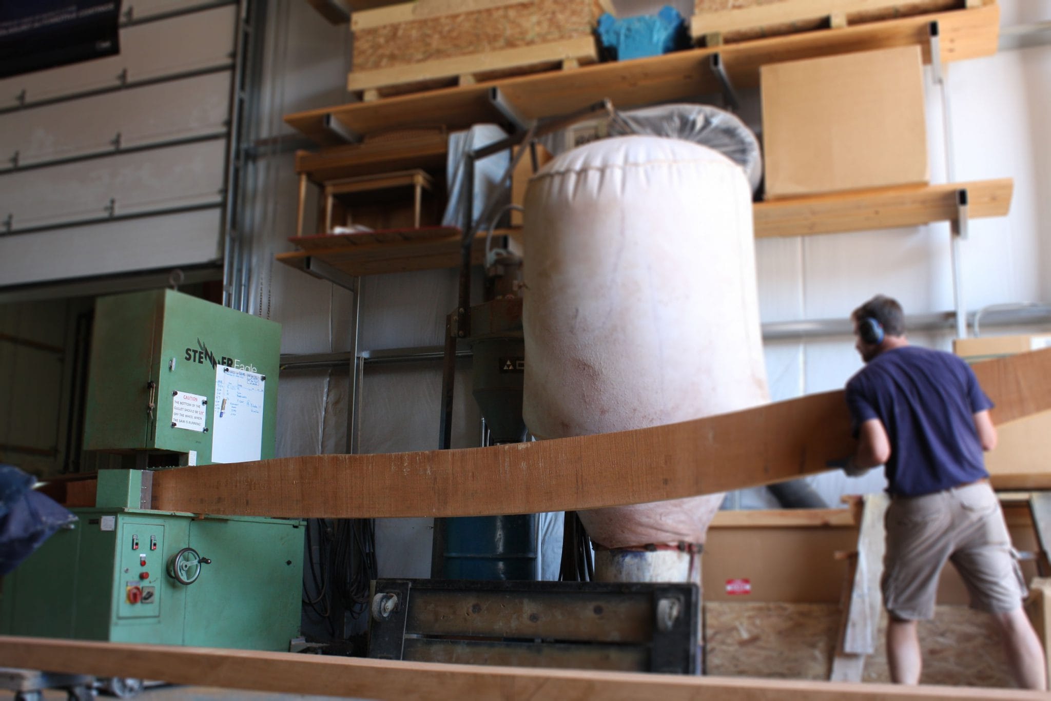 The Van Dam crew sanding a beam