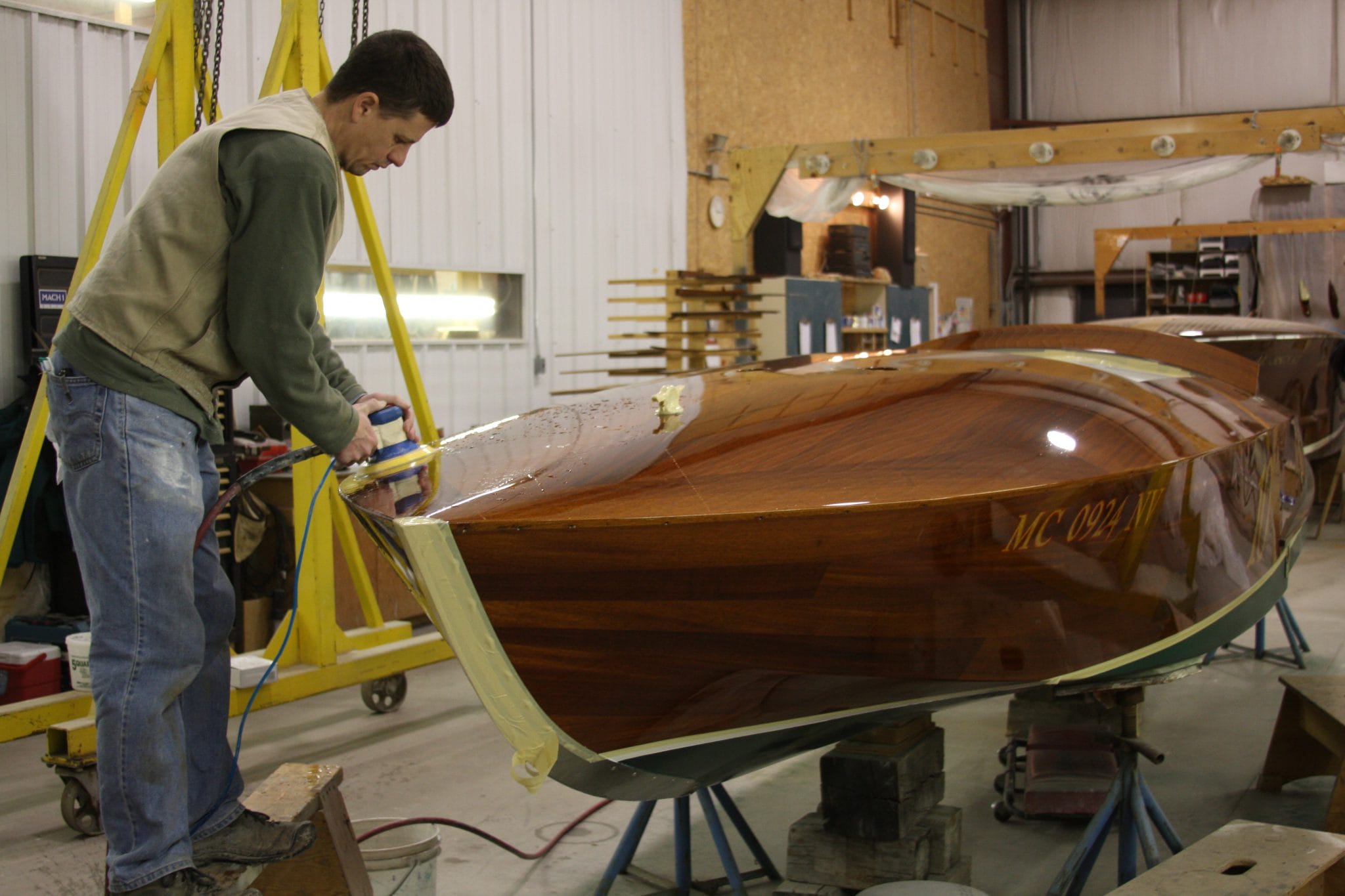 Buffing out clear coat to perfect shine on runabout, Flicker.