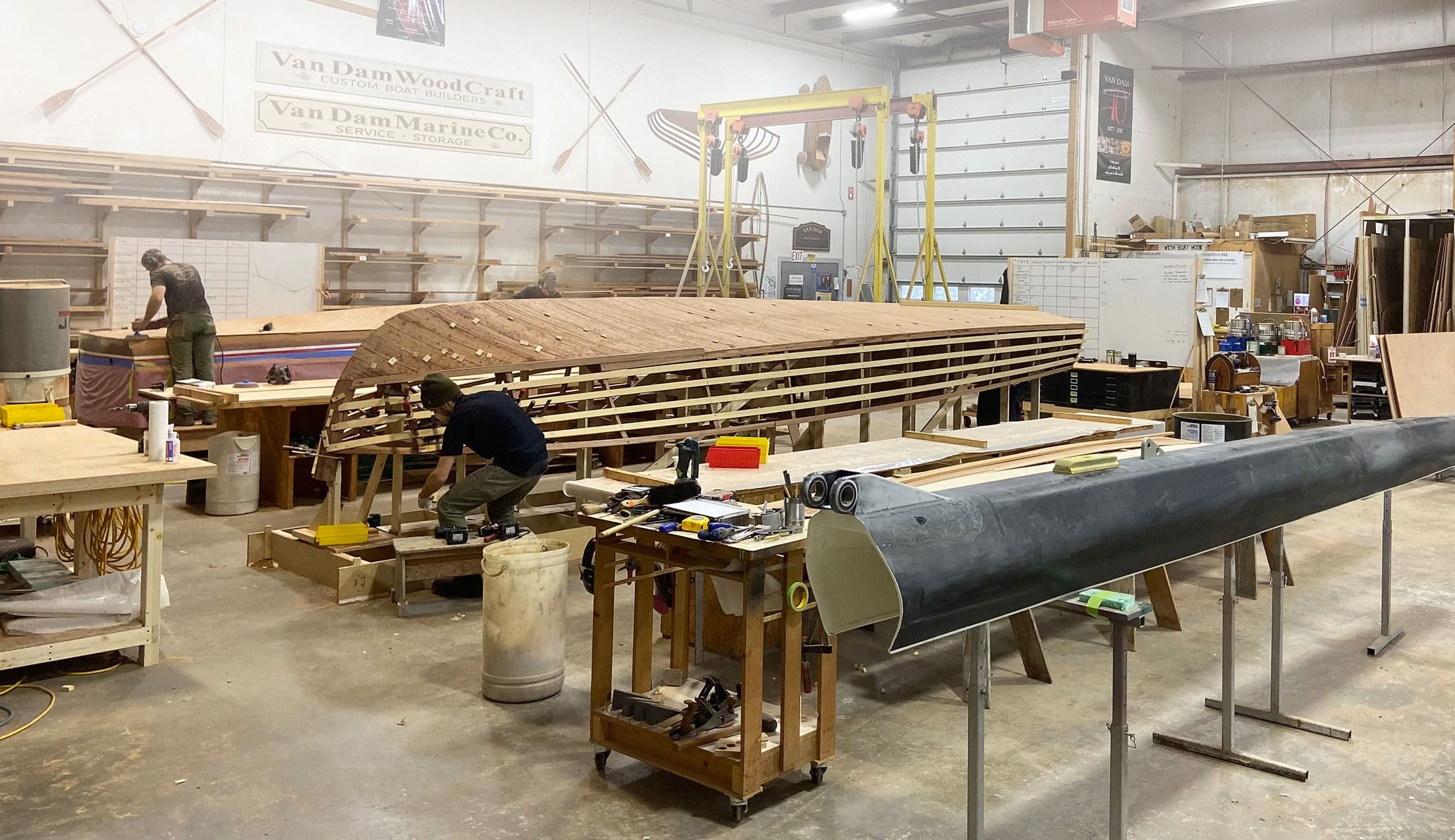 Van Dam employees working in the workshop.